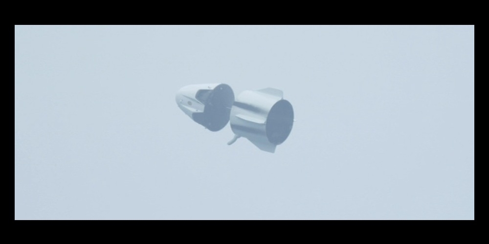De onbemande Dragon ruimtecapsule tijdens de eerste Pad Abort Test